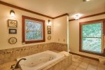 Private, master bath with jetted tub and heated floors
